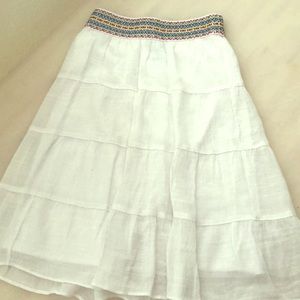 White skirt with pattern on top